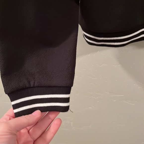 Women’s Long Sleeved Jacket, Black W/ Red and White Stripes around Cuffs & Hem - Picture 2 of 6